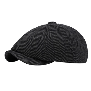 Classic herringbone newsboy cap in charcoal grey with vintage British wool tweed style