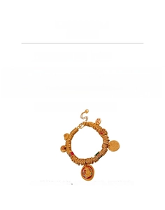 Detail view of gold-plated Chinese Fu character bracelet with dimensions and copper material