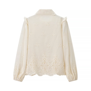 Elegant ivory hollow embroidered long sleeve top with scalloped lace hem and ruffle details