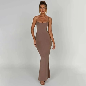 Detailed close-up of light brown backless strap maxi dress with slim fit tailoring