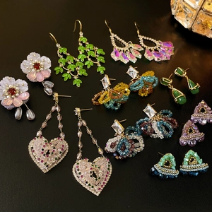 Detailed collection of floral pearl earrings with colorful crystals and beads