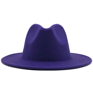 Detailed view of the purple wool felt jazz fedora hat with wide flat brim on white background