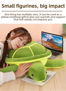 Detail of soft green plush sea turtle pillow featuring yellow checkered shell pattern