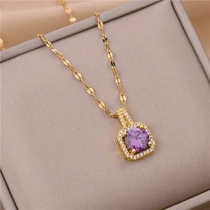 Golden square necklace with purple zircon pendant and water wave chain in jewelry box