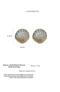 Detail view of shell earrings with size dimensions 1.7cm by 1.6cm and zircon settings