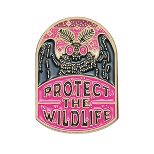 Dark aesthetic black moth enamel pin with Protect The Wildlife slogan and pink stars
