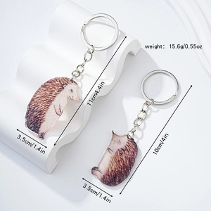 Detailed size and weight specs for hedgehog acrylic keychains on white background