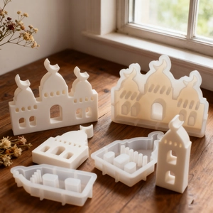 Detailed silicone mold set for Islamic mosque candles and resin ornaments on dark wood