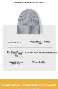 Detail view of light grey cable knit beanie with faux rabbit fur material and size specs