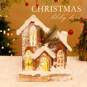 LED lighted wooden Christmas house ornament with snow finish and pine needle detail