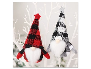 Detail of Christmas gnomes with plaid hats and long beards hanging on white branches