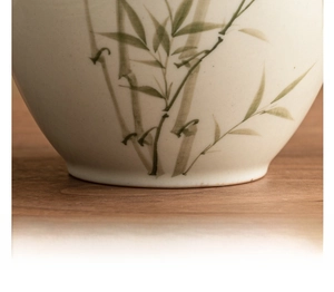 Close-up of the smooth polished base of a ceramic tea canister for stable placement