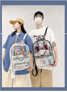 Detail view of transparent PVC backpacks with rainbow and striped shoulder straps