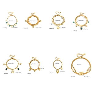 Gold multi-style stainless steel chain bracelets with evil eye, heart and butterfly charms