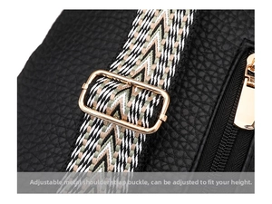 Detail of lychee pattern leather chest bag with woven strap and gold hardware