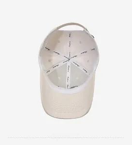 Detail showing the internal seams with Fashion tape and 100% cotton wash label of the cap