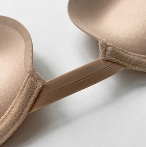 Close-up of seamless nude push-up bra center bridge and flexible connection detail