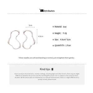 Detail view of silver liquid metal earrings showing 4.9cm by 3cm size and 5.2g weight
