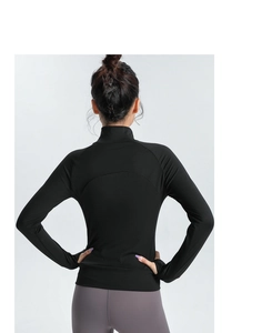 Slim fit black sports jacket with stand-up collar and curved back seams for yoga and running