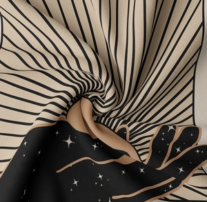 Macro detail showing soft high-density printed fabric with starry sky and stripe patterns
