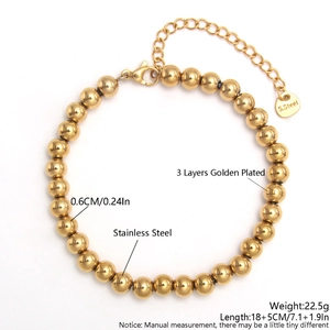 Detail of 18k gold plated 6mm stainless steel ball bracelet with 18+5cm adjustable chain
