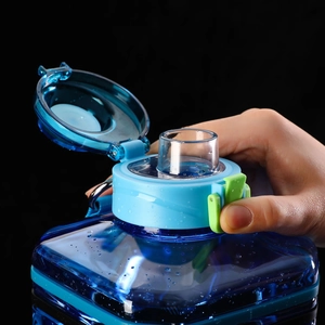 Close-up of 2.2L square sports water bottle showing the flip-top lid and safety lock detail
