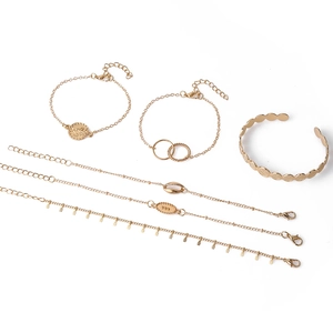 5-piece gold bracelet set with butterfly, moon, coin charms and shell decorations
