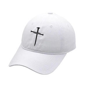 White washed cotton baseball cap with black embroidered cross design on the front