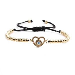 Bracelet pendentif cœur élégant avec motif œil protecteur et perles or et noires