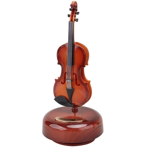 Retro violin music box with mahogany wood texture and golden Music Box nameplate