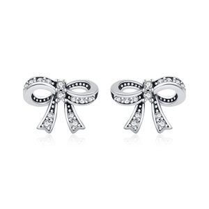 Sparkling s925 silver bow stud earrings with vintage finish and brilliant zircon stones