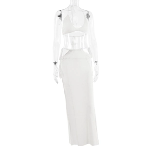 Dettaglio del set due pezzi in maglia bianca con top all'americana e gonna lunga