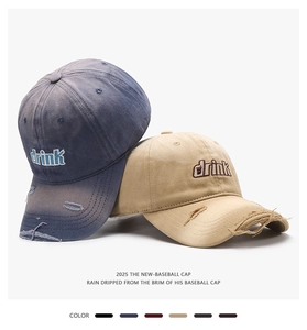 Detail view of distressed baseball cap brims and 3D 'drink' letter embroidery