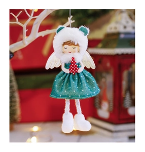 Detail of Christmas angel doll hanging ornament with white wings and green plush dress