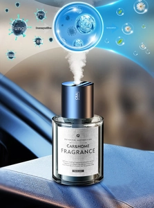 Detailed view of the 160ml blue metal car scent diffuser with a clear glass bottle body