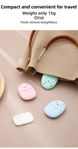 Three bear-shaped portable soap boxes in pink, blue and green colors for travel
