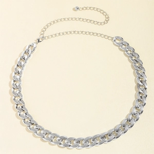 Detail of silver acrylic Cuban chain link waist belt with adjustable lobster clasp and extender