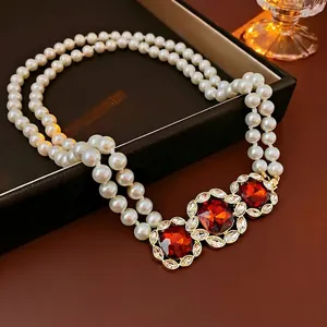 Vintage double layer pearl necklace with square red rubies and gold accents
