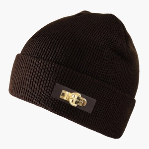 Close-up of dark brown ribbed beanie featuring a leather patch with a golden 1999 metal ring