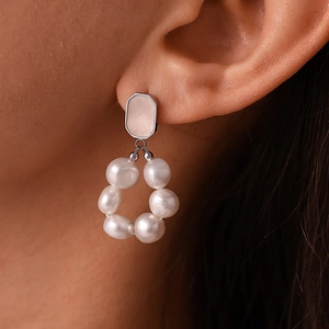 Lustrous freshwater pearl hoop earrings with shell inlay on a silver octagon base