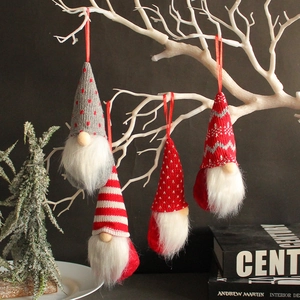 Set of 4 knitted Christmas forest gnomes with red hanging strings for tree decoration