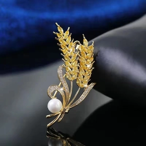 Elegant wheat ear crystal brooch with golden alloy, white pearls and sparkling rhinestones