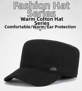Detail of men's black flat top military cap with metal CHINA logo and warm ear protection