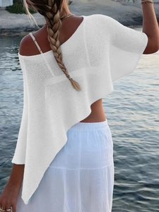 Rear view of white semi-sheer knit beach cover-up with an asymmetrical hemline