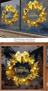 Detail of golden Christmas wreath window sticker with Merry Christmas text and bow