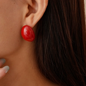 Retro geometric oval red enamel stud earrings for women with a glossy pebble-like finish