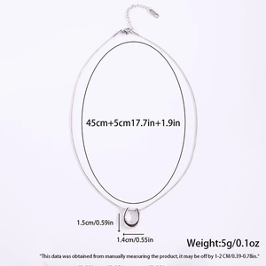 Detail showing dimensions and 5g weight of the silver U-shaped stainless steel pendant
