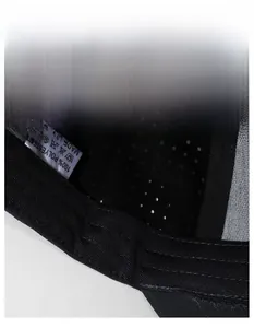 Detail of moisture-wicking sweatband and 100% polyester mesh fabric inside baseball cap