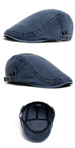 Detail der vintage gewaschenen Denim-Schiebermütze mit Seitenschnallen und Innenetikett