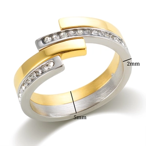 Detail showing 2mm and 5mm width measurements of a two-tone gold and silver ring